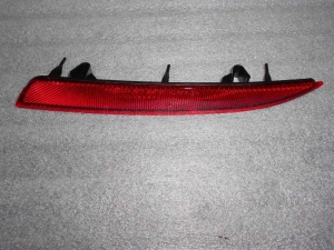 Odblask lewy zderzaka tylnego Opel Astra J